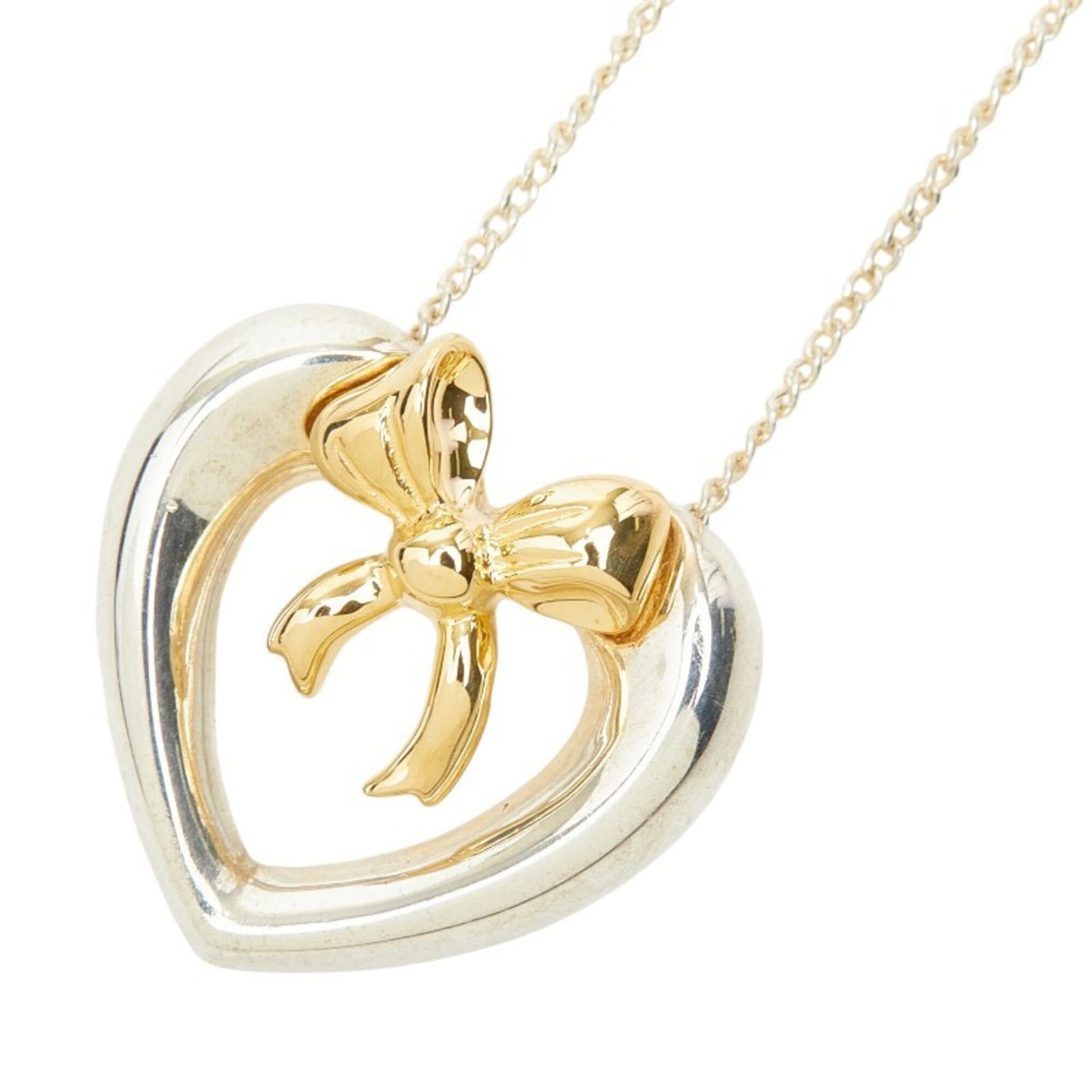 Tiffany & Co. Heart Ribbon Necklace Sv925 Sterling Silver 18K Yellow Gold Women'S.: Tiffany & Co. Heart Ribbon Necklace Sv925 Sterling Silver 18K Yellow Gold Women'S. Tiffany & Co. Heart Ribbon Necklace in sterling silver and 18K yellow gold, featuring a 17mm x 18.1mm pendant with a 