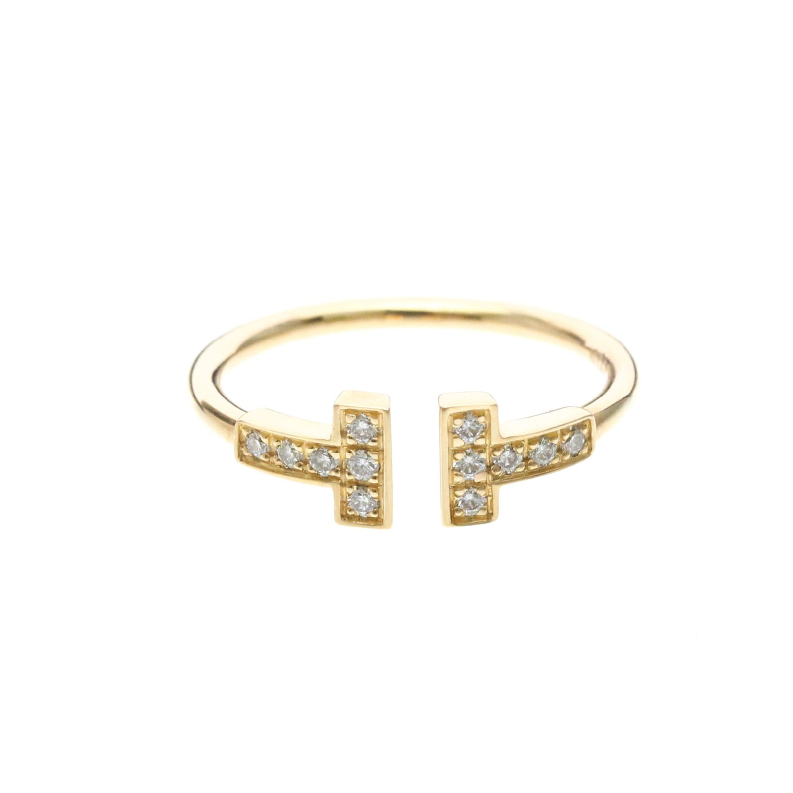 Tiffany Band Ring Pink Gold (18K): Tiffany Band Ring Pink Gold (18K) Pink gold (18K) Tiffany Band Ring with Diamond features a stylish wire ring design, showcasing a diamond set in an elegant band. Made from high-quality pink gold, thi
