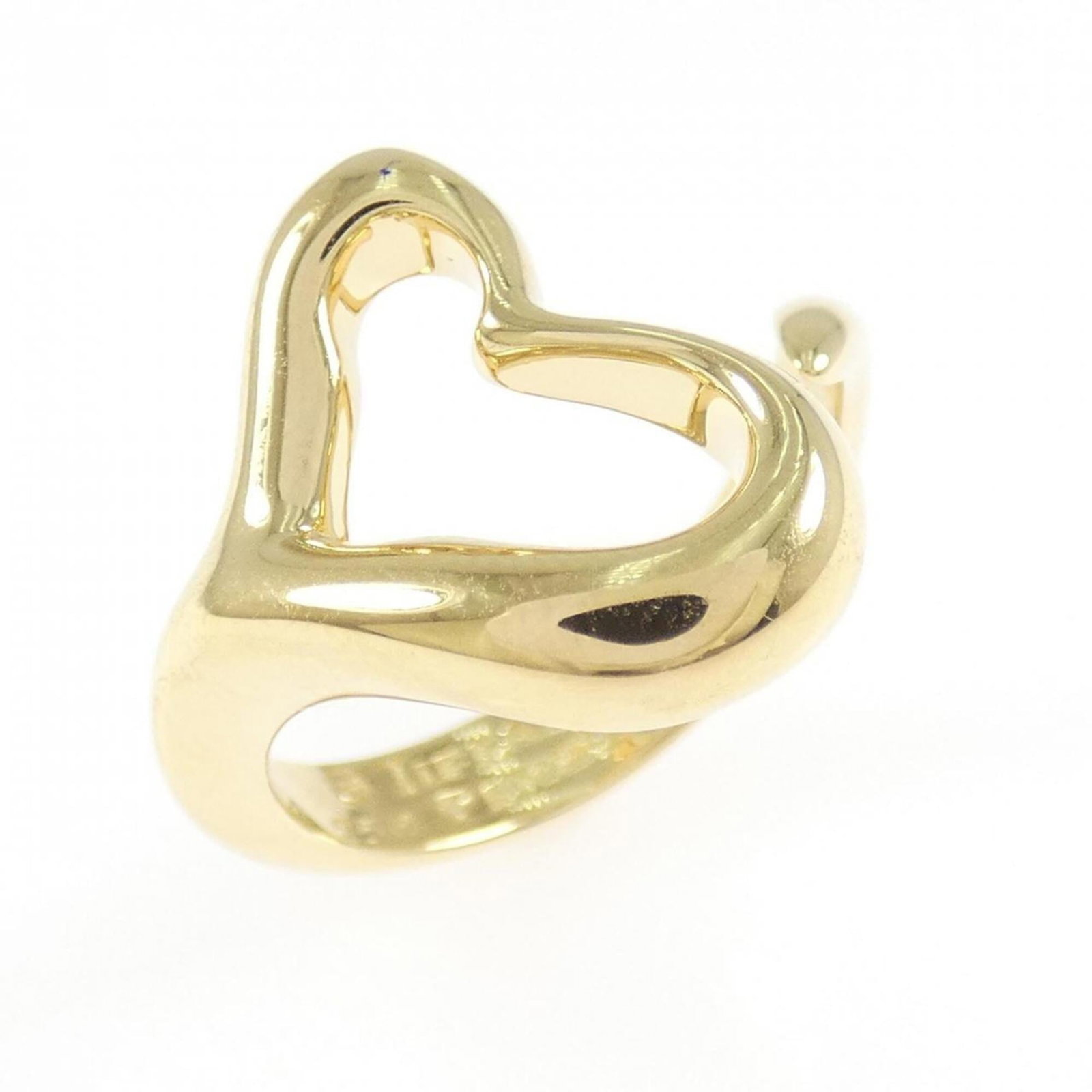 Tiffany ring gold 18k yellow band: Tiffany ring gold 18k yellow band Yellow gold (18K) band ring from Tiffany's, featuring an open heart design. This 5.5 US size ring boasts a width of 15.8mm and weighs 7.1g. Made from high-quality yel