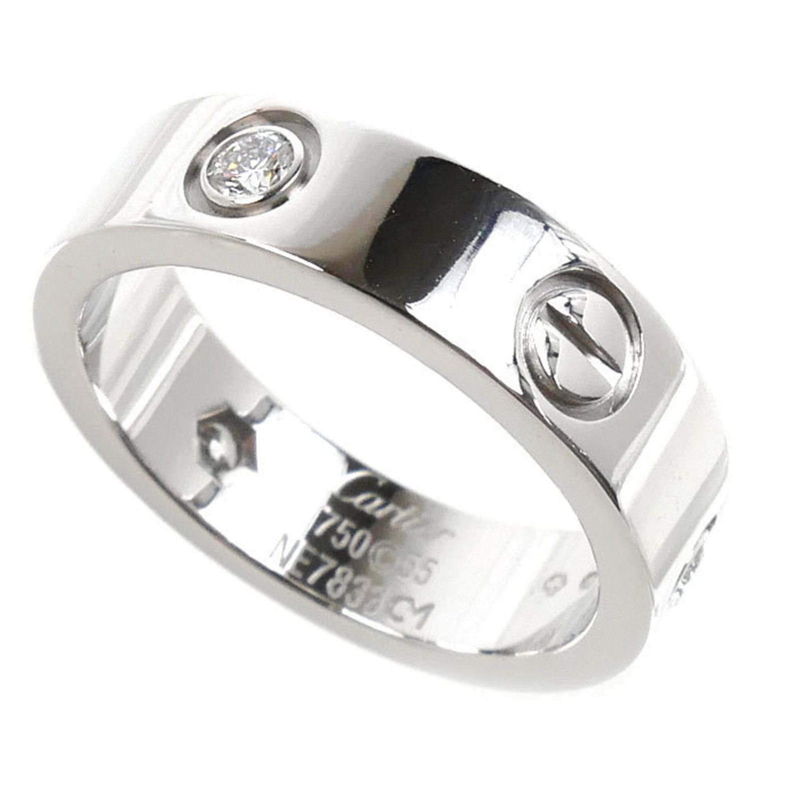 White Gold Band Ring by Cartier 18K: White Gold Band Ring by Cartier 18K Cartier's 18K white gold band ring boasts a sleek design, featuring a diamond stone. The ring's size and style align with US size 7.5, making it suitable for those 