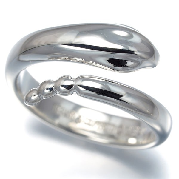Silver Snake Ring Us5 925 Sterling Tiffany&Co: Silver Snake Ring Us5 925 Sterling Tiffany&Co Sterling silver snake ring from Tiffany & Co., featuring a sleek design with a width of 9.7mm and a base metal thickness of 3.8mm, crafted from 925 / Ster