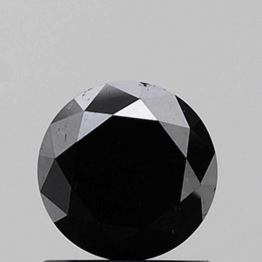 Round 1.26ct Fancy Black VVS2 - Loose Natural Diamond: Round 1.26ct Fancy Black VVS2 - Loose Natural Diamond Round 1.26ct Fancy Black VVS2 - Loose Natural Diamond boasts exceptional clarity and color, with its EX polish and symmetry showcasing its natural