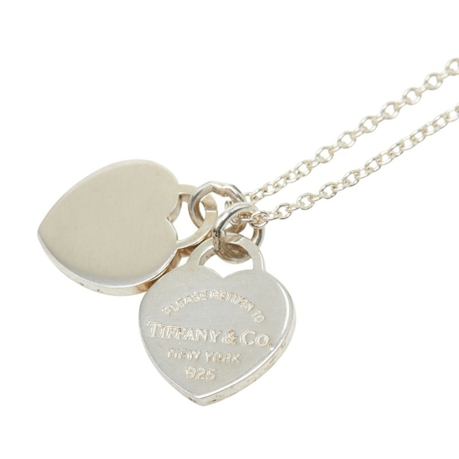 Silver double heart tag necklace for women Sv925 by Tiffany & Co.: Silver double heart tag necklace for women Sv925 by Tiffany & Co. Silver double heart tag necklace for women Sv925 by Tiffany & Co. features a delicate pendant with a 12.6mm x 12.2mm silver 925 design