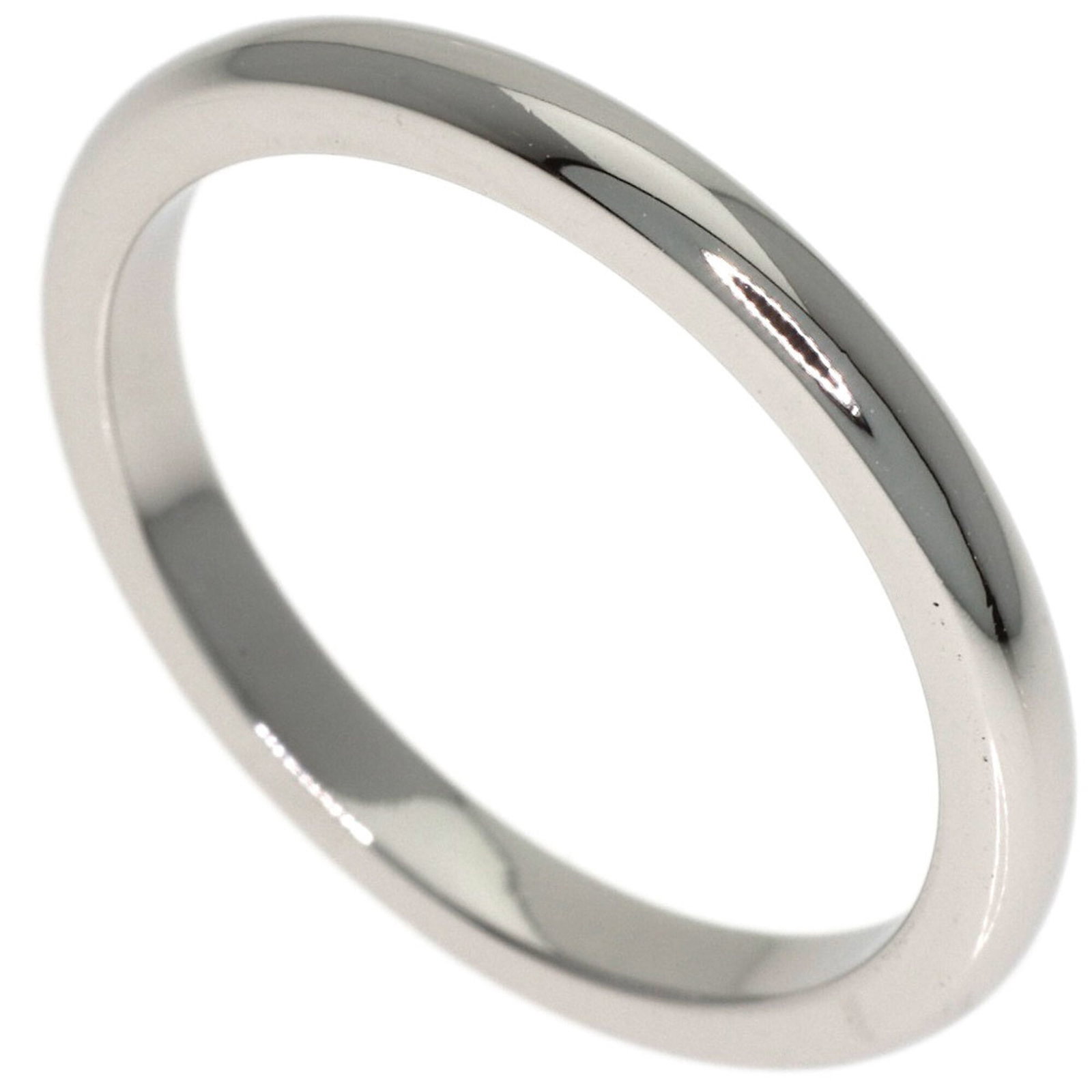 Ring platinum band 950 Tiffany: Ring platinum band 950 Tiffany Platinum band ring from Tiffany, featuring a 950 platinum construction and US size 4.5. This elegant band showcases the luxury of Tiffany's craftsmanship, with its