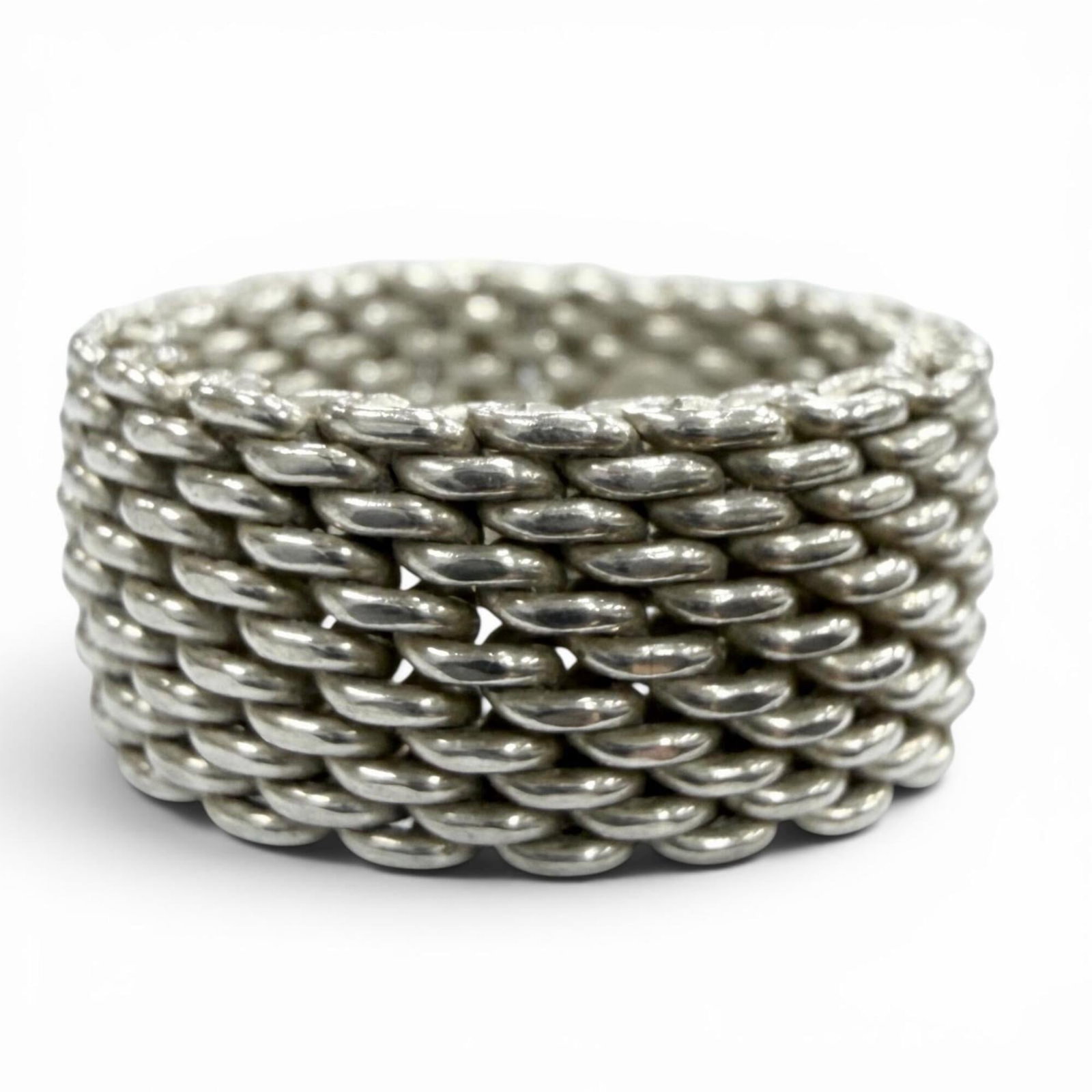 Silver Ring Band Tiffany: Silver Ring Band Tiffany Silver Ring Band Tiffany, made from high-quality Silver 925 US. This elegant band ring features a sleek and modern design, perfect for everyday wear. Available in size 7,