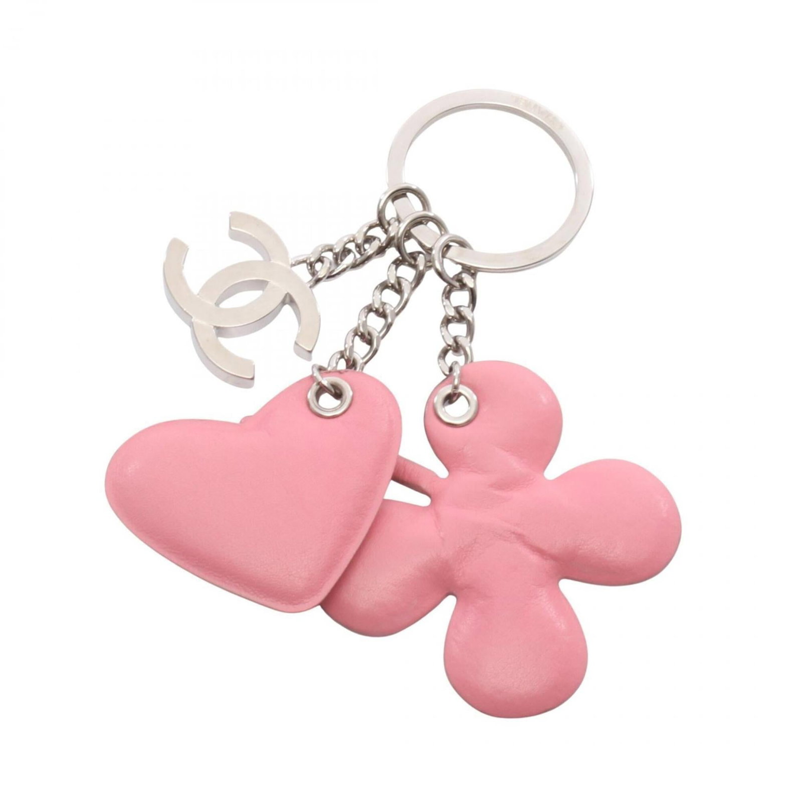 Chanel Handbag Charm Leather: Chanel Handbag Charm Leather Pink lambskin leather and silver details make this Chanel handbag charm stand out. The elegant design features the iconic brand's signature style, showcasing a beautiful
