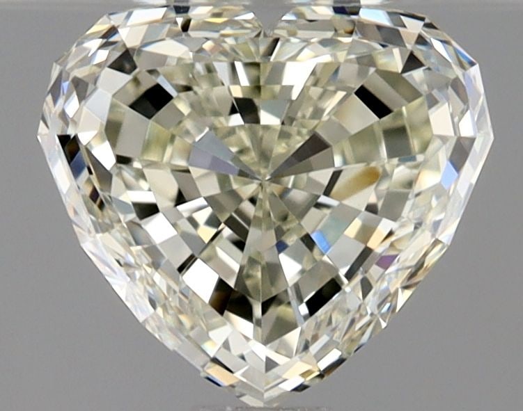 HRD Heart 1.0ct K VVS2 - Loose Natural Diamond: HRD Heart 1.0ct K VVS2 - Loose Natural Diamond 1.0ct K VVS2 - A rare and exceptional natural diamond, certified by HRD, boasts an EX polish and symmetry, showcasing its exceptional brilliance in the