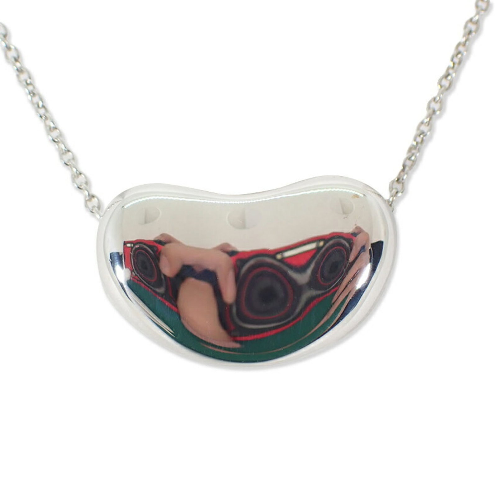 Bean Pendant Necklace by Tiffany and Co.: Bean Pendant Necklace by Tiffany and Co. Sterling silver 925, the Bean Pendant Necklace by Tiffany and Co. boasts a sleek design with a pendant size of 11.9mm x 18.9mm. The necklace features a comfort