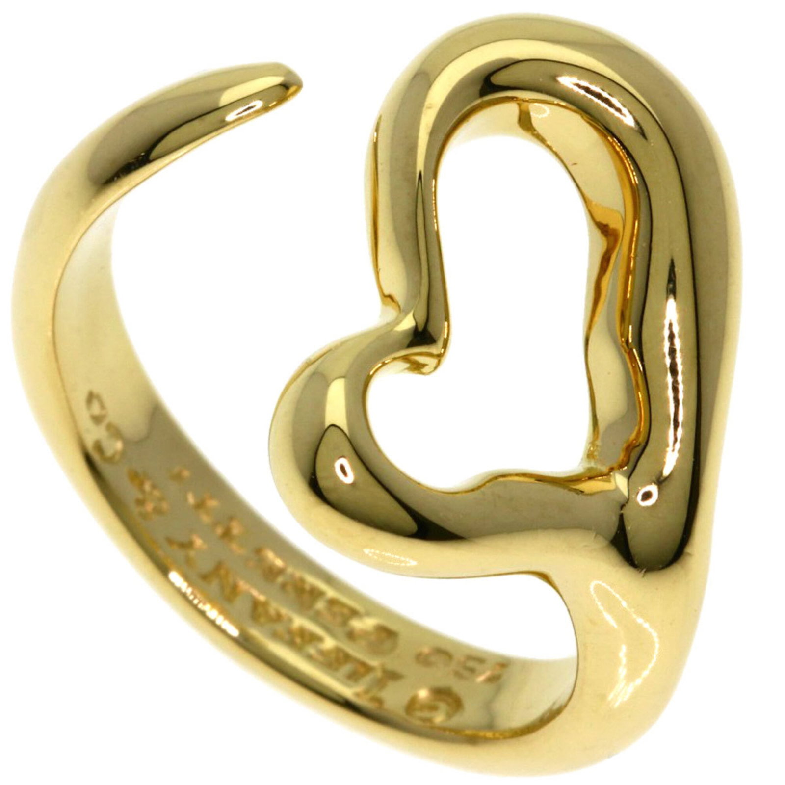 Tiffany ring gold 18k yellow band: Tiffany ring gold 18k yellow band 18k yellow gold band with a Tiffany ring, available in US size 5.5. This women's band features high-quality yellow gold material and bears the signature of its
