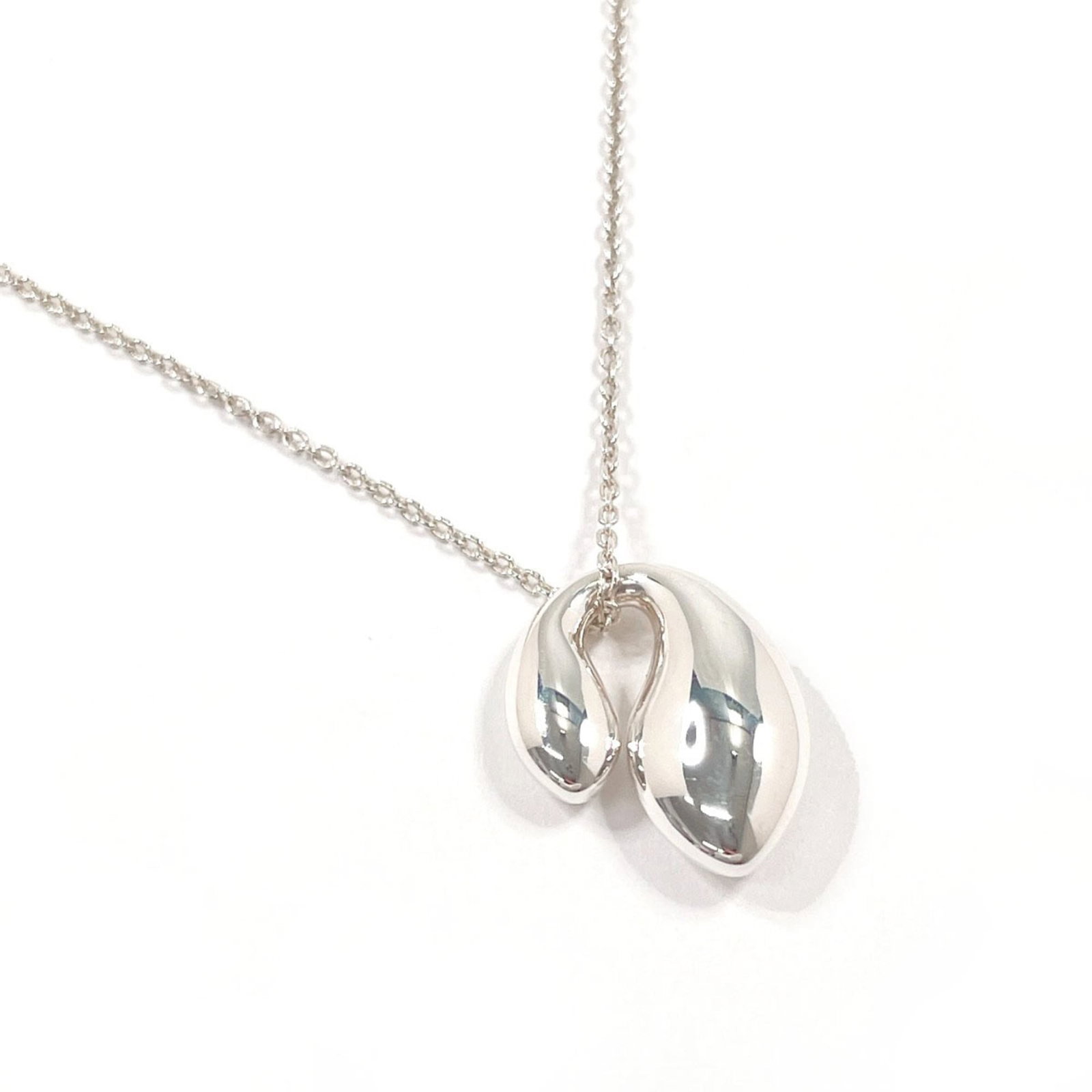 Elsa Peretti Necklace for Women Sterling Silver Tiffany & Co. Double Teardrop: Elsa Peretti Necklace for Women Sterling Silver Tiffany & Co. Double Teardrop Sterling silver necklace from Tiffany & Co. featuring a double teardrop pendant in Spain, measuring 16mm x 13mm and suspen