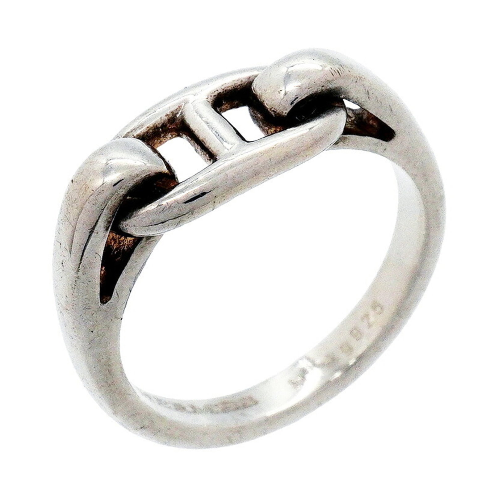 Ring silver band 925 by Hermes: Ring silver band 925 by Hermes Silver band ring by Hermes, made from high-quality silver (925), featuring a classic design. This elegant piece is suitable for women and comes in size 6 US. The ring's
