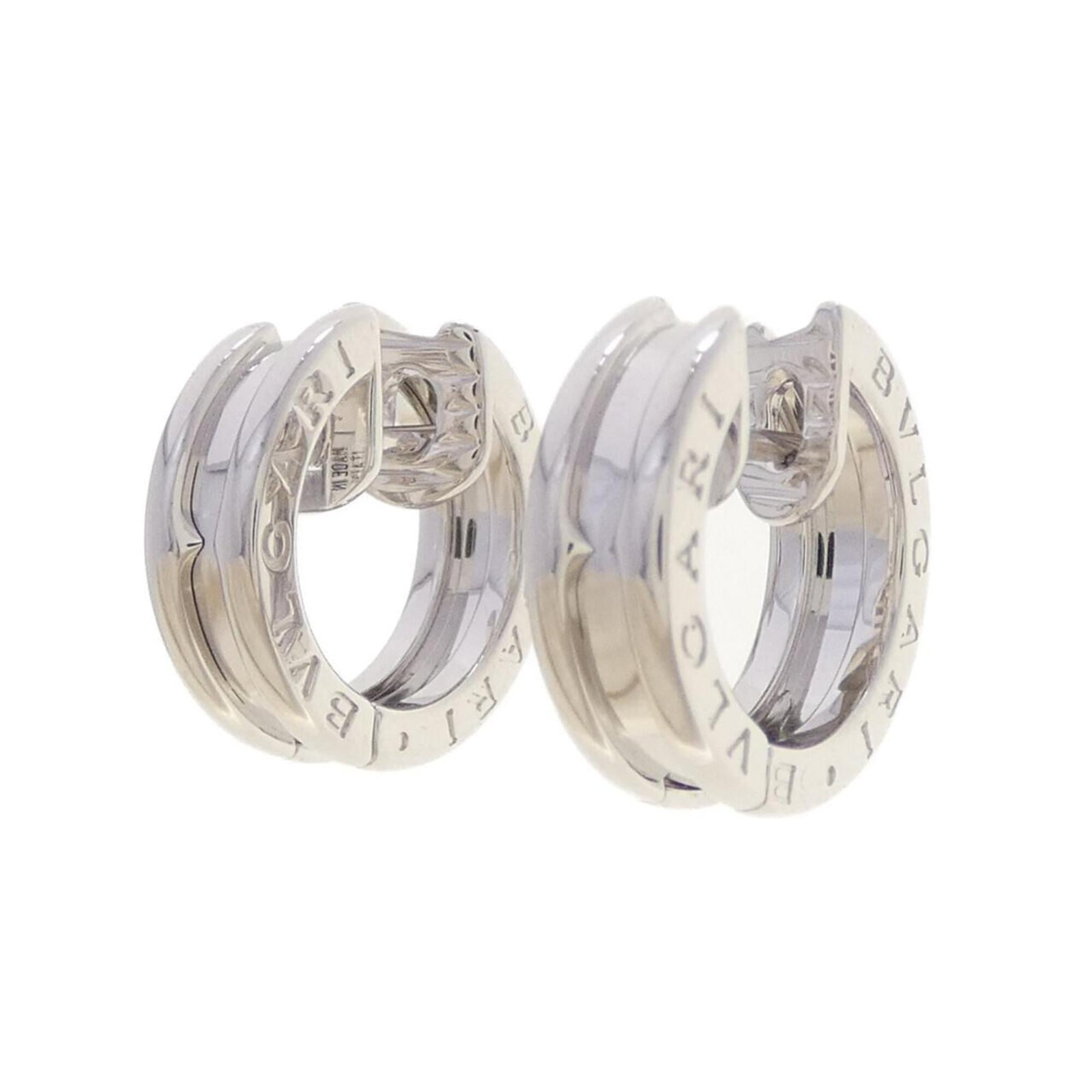 Bvlgari Stud Earrings White Gold (18K): Bvlgari Stud Earrings White Gold (18K) Bvlgari Stud Earrings White Gold (18K) are sleek and sophisticated, featuring the iconic B.zero1 line. Made from high-quality white gold (18K), these stud