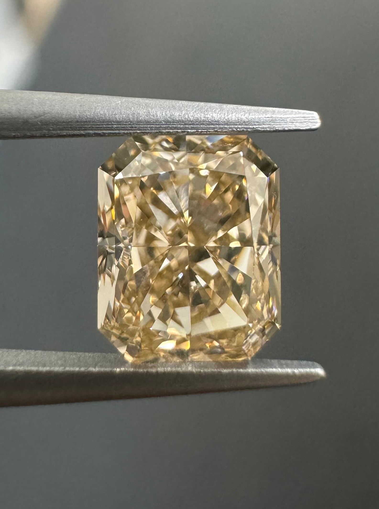 GIA Radiant 1.01ct Fancy Light Yellowish Brown VVS2 - Loose Natural Diamond: GIA Radiant 1.01ct Fancy Light Yellowish Brown VVS2 - Loose Natural Diamond GIA-certified, this 1.01ct Fancy Light Yellowish Brown VVS2 diamond boasts exceptional clarity and polish, with a striking l