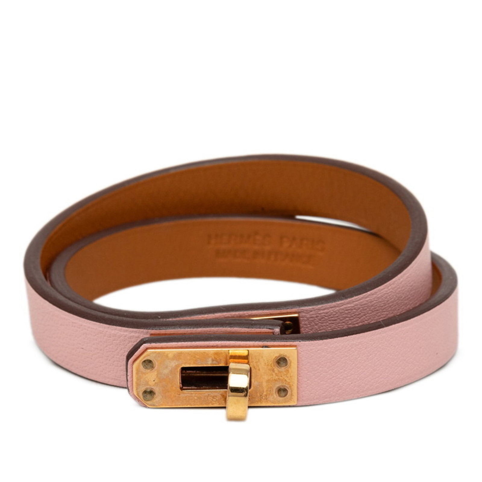 Hermes Charm Bracelet Leather: Hermes Charm Bracelet Leather Pink leather charm bracelet from Hermes, measuring 35cm in length. This classic design showcases the timeless elegance of leather craftsmanship. A beautiful accessory for