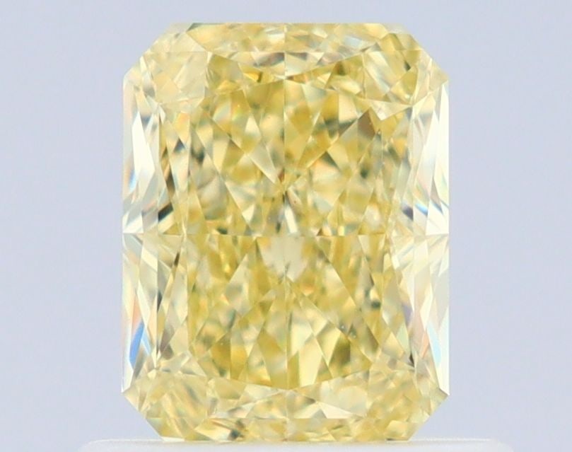 GIA Radiant 0.77ct Fancy Yellow VVS2 - Loose Natural Diamond: GIA Radiant 0.77ct Fancy Yellow VVS2 - Loose Natural Diamond GIA-certified, this 0.77ct Fancy Yellow VVS2 diamond boasts exceptional clarity and color, with EX polish and VG symmetry. Its natural