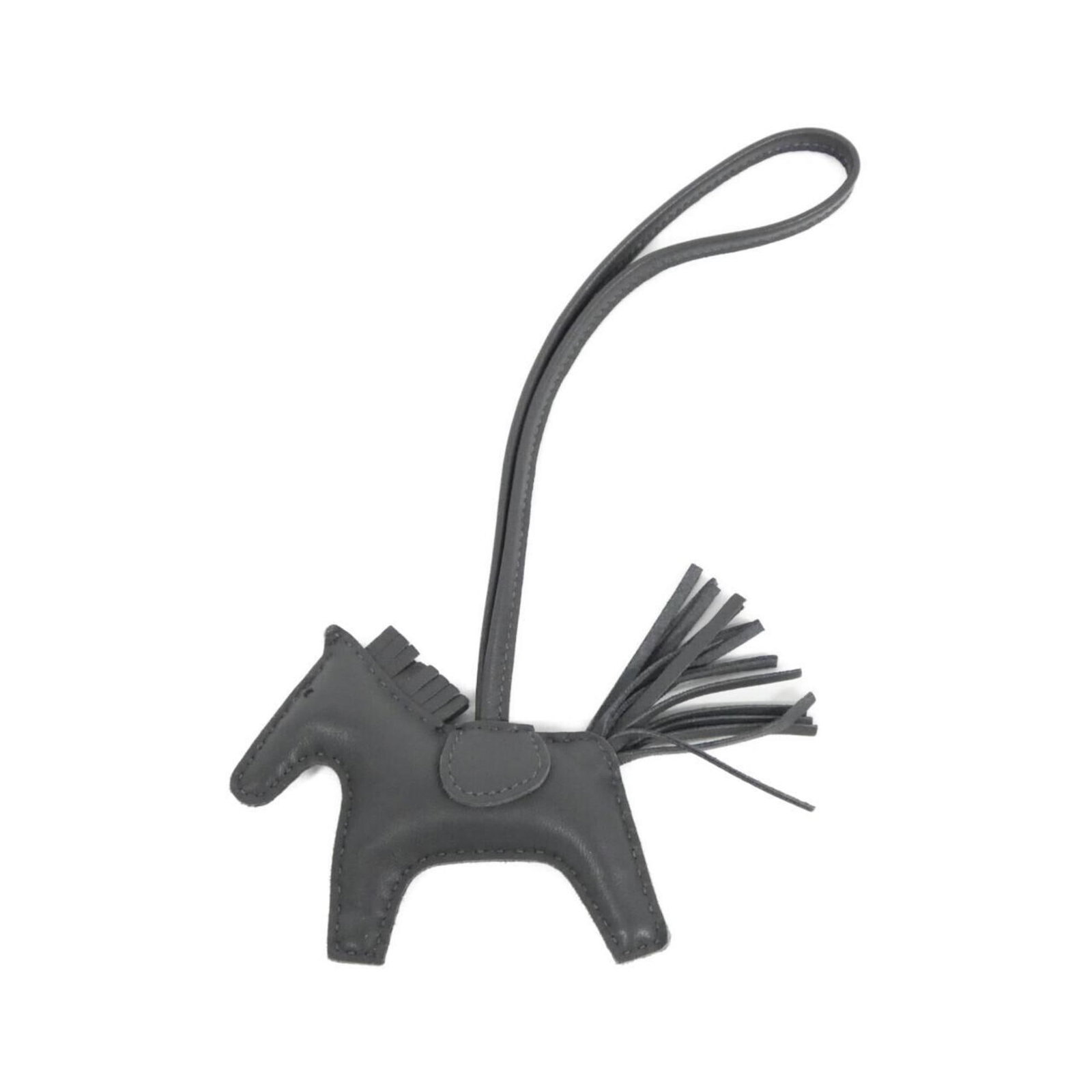 Agneau Handbag Charm Hermes: Agneau Handbag Charm Hermes Agneau Handbag Charm by Hermes features an Ardoise, Gray agneau Milo material with a signature. The charm measures 70.00mm x 85.00mm and comes on a 350.00mm chain. It is pr