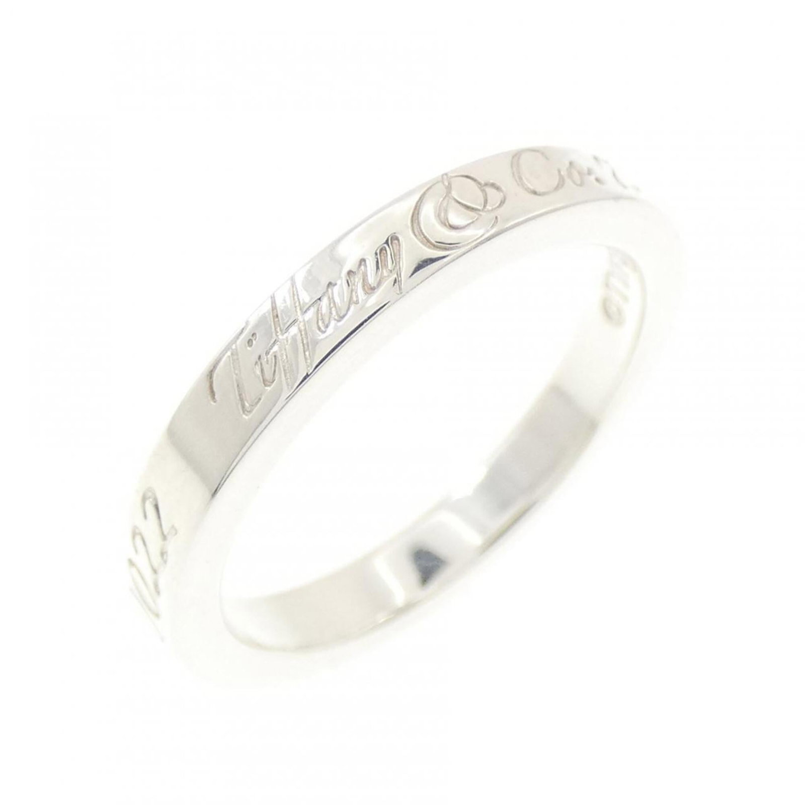 Silver Ring Band Tiffany: Silver Ring Band Tiffany Silver Ring Band Tiffany is made from 925 US Silver and features a classic design. This women's band ring has a sleek, modern look with a silver finish that adds a touch of so