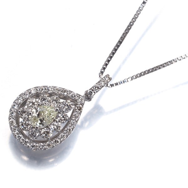 Clear & Yellow Diamond Pear-Shaped Teardrop Necklace Pt 900/ Pt 850: Clear & Yellow Diamond Pear-Shaped Teardrop Necklace Pt 900/ Pt 850 Platinum teardrop pendant featuring a clear and yellow diamond, weighing a total of 0.50ct, suspended from an adjustable 45cm neckla
