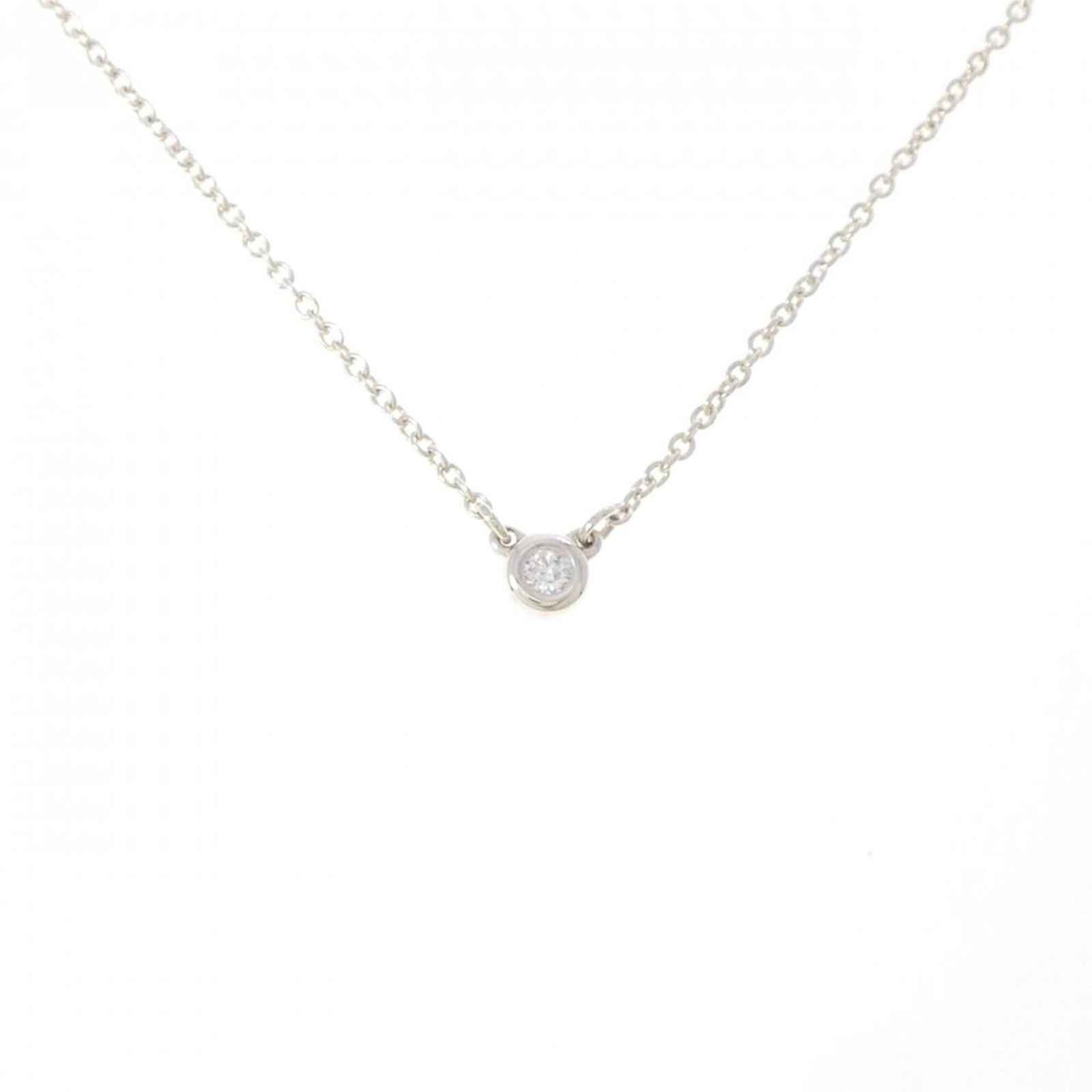 By The Tiffany Co Necklace Yard: By The Tiffany Co Necklace Yard Silver Tiffany Necklace Yard features a 3.7mm x 3.7mm diamond pendant suspended from a 47 cm / 18.5'' chain, crafted from sterling silver 925 material. The necklace boa