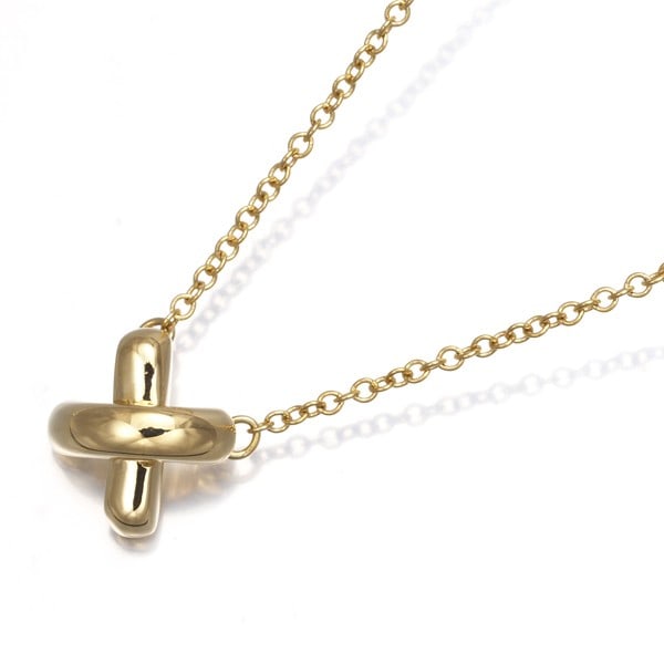 Yellow gold necklace cross stitch 18k 750 Tiffany: Yellow gold necklace cross stitch 18k 750 Tiffany Yellow gold necklace with intricate cross stitch design, crafted from 18k / 750 yellow gold. The pendant measures 7.4 x 7.2mm and is part of a Tiffany