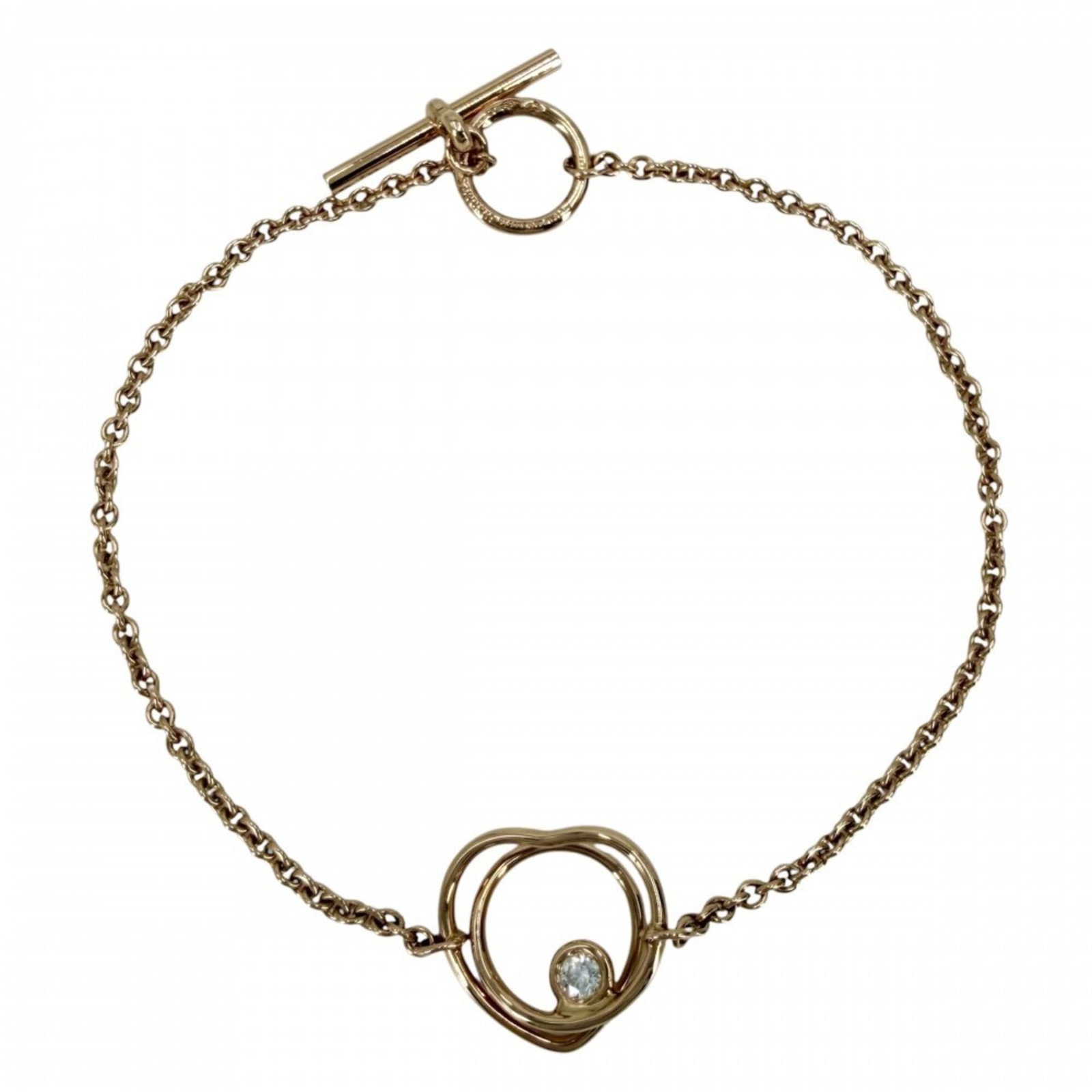 Pink Gold Charm 18k Hermes: Pink Gold Charm 18k Hermes Pink Gold Charm 18k Hermes - A delicate pink gold charm bracelet featuring 18k pink gold, measuring 16.5cm in length. This elegant piece showcases the timeless craftsmanship