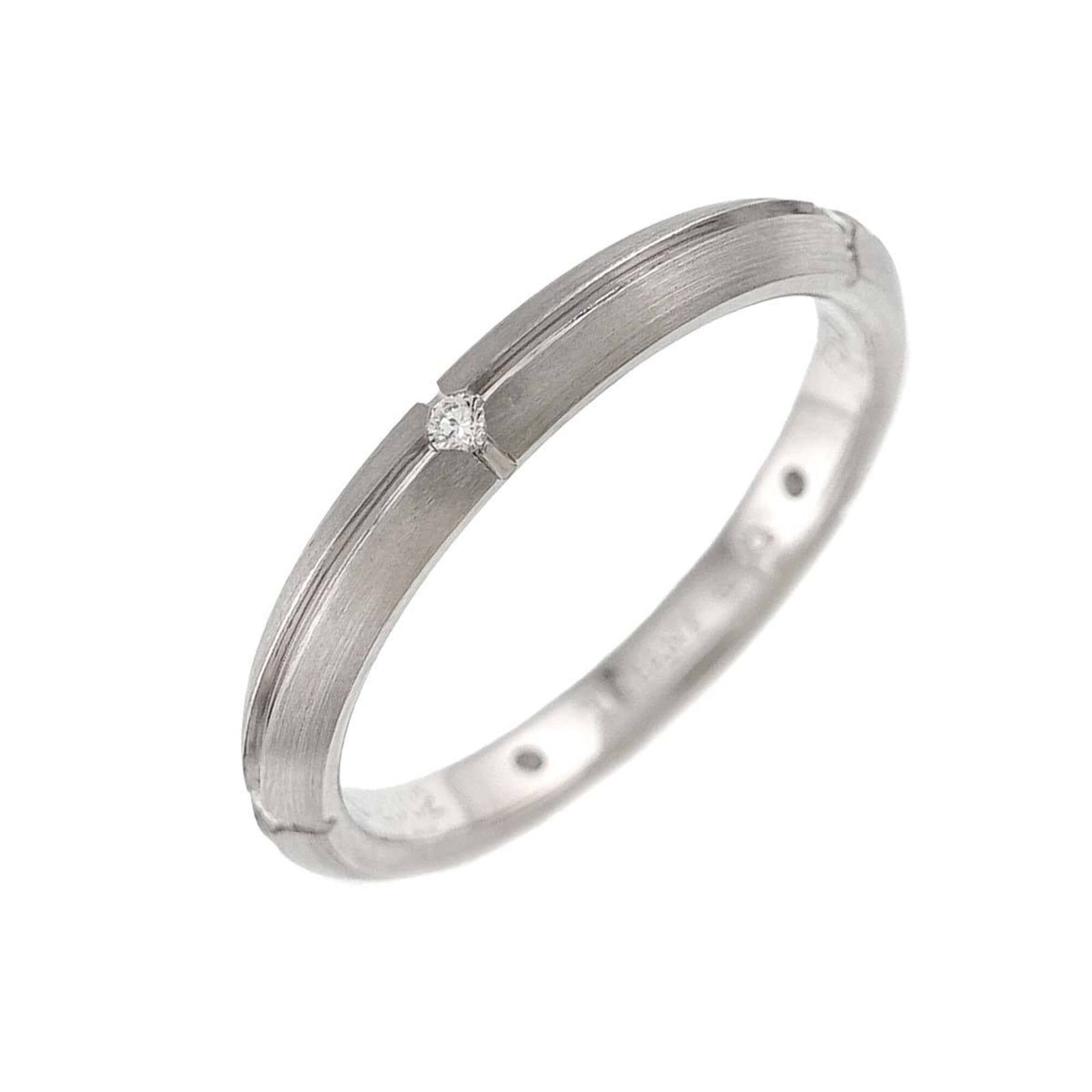 White Gold Tiffany Band Ring 18K: White Gold Tiffany Band Ring 18K 18K white gold Tiffany band ring in US size 5, crafted with elegant simplicity. This classic design showcases the timeless beauty of white gold, perfect for everyday