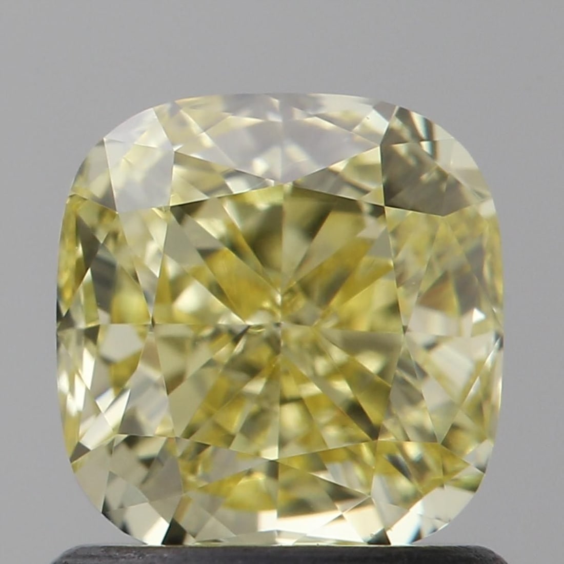 GIA Cushion Brilliant 1.0ct Fancy Yellow VVS2 - Loose Natural Diamond: GIA Cushion Brilliant 1.0ct Fancy Yellow VVS2 - Loose Natural Diamond GIA certified, this 1.0ct Fancy Yellow VVS2 diamond boasts exceptional clarity and color, with a vibrant yellow hue that shines in