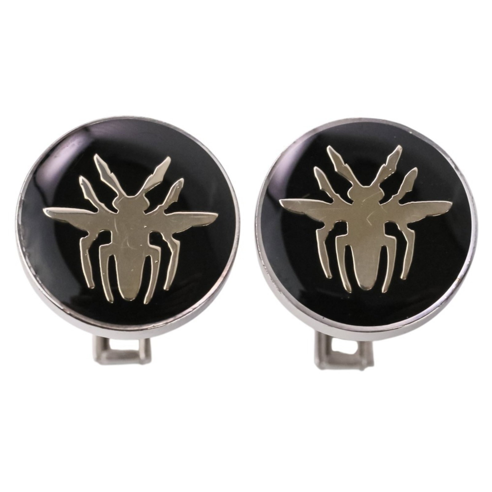 Dior Stud Button Silver 925: Dior Stud Button Silver 925 The Dior Stud Button Silver 925 boasts sleek, modern design with a sophisticated black finish. Crafted from high-quality silver 925 material, this stud button exudes unders