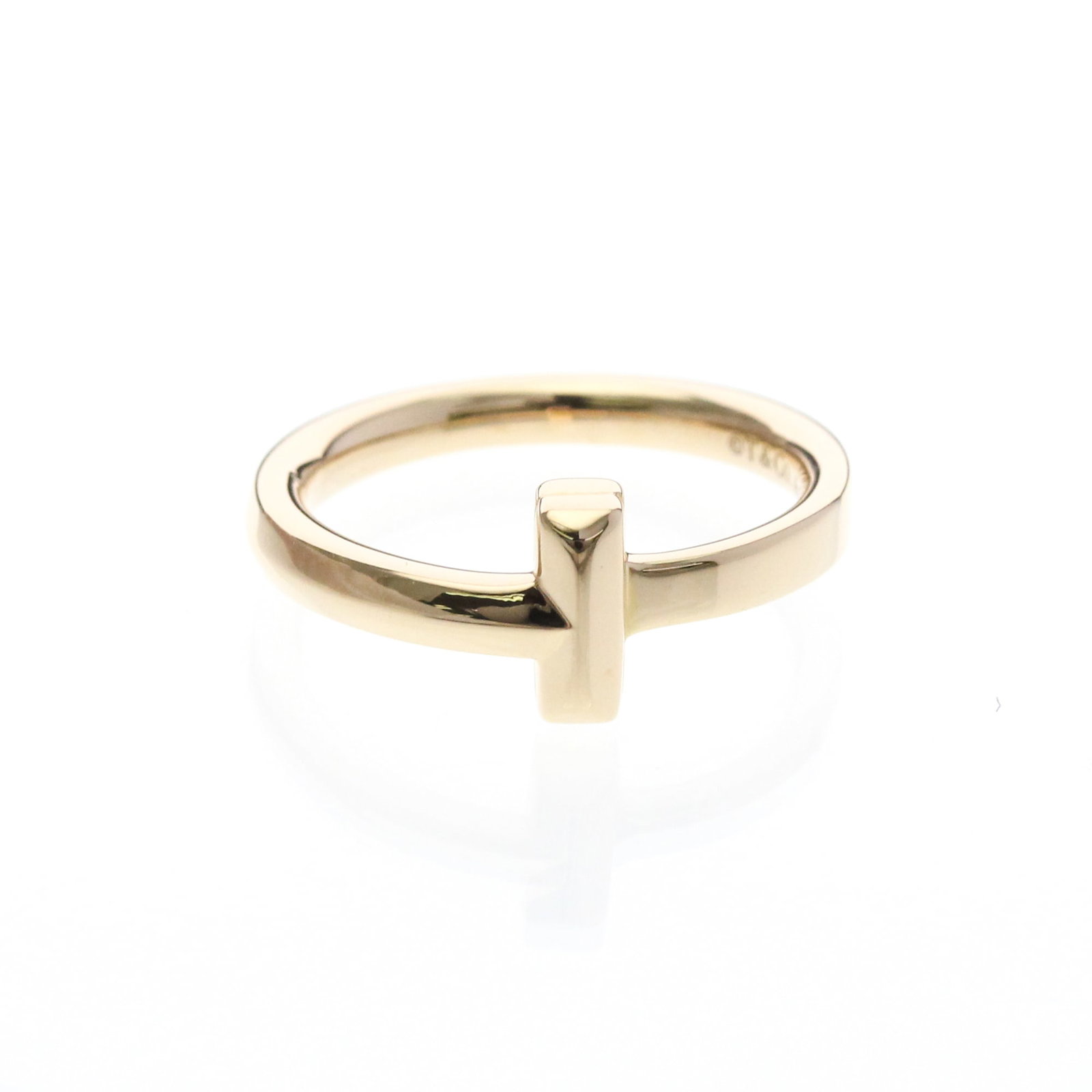 Tiffany Band Ring Pink Gold (18K): Tiffany Band Ring Pink Gold (18K) Pink gold (18K) band ring with a sleek, narrow design. This Tiffany model features a stylish fashion ring in pink gold, measuring 3.5 US size and 2.5mm wide. Weighing