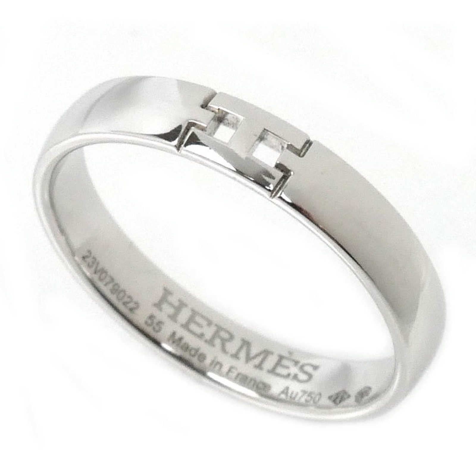 White Gold Hermes Ring Band: White Gold Hermes Ring Band White Gold Hermes Ring Band features an elegant design with a high-quality white gold (18K) material, crafted in France. This band ring boasts a classic style with a notabl