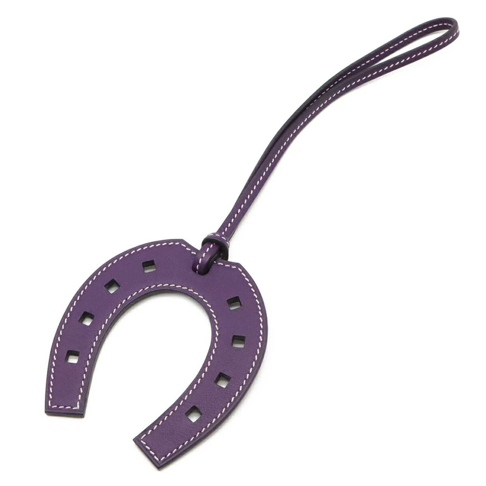 Swift leather handbag charm by Hermes: Swift leather handbag charm by Hermes Swift leather handbag charm by Hermes features a striking purple color and precise measurements, making it a notable accessory. Measuring just 8.00mm x 7.40mm in 