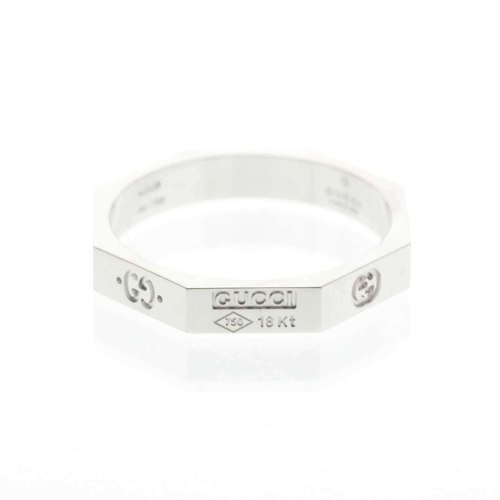 White Gold 18k Gucci Ring Band: White Gold 18k Gucci Ring Band White Gold 18k Gucci Ring Band features an Octagonal design, crafted from high-quality White gold (18K) metal. Weighing in at 4.5g and measuring 3.6mm in width, this ele