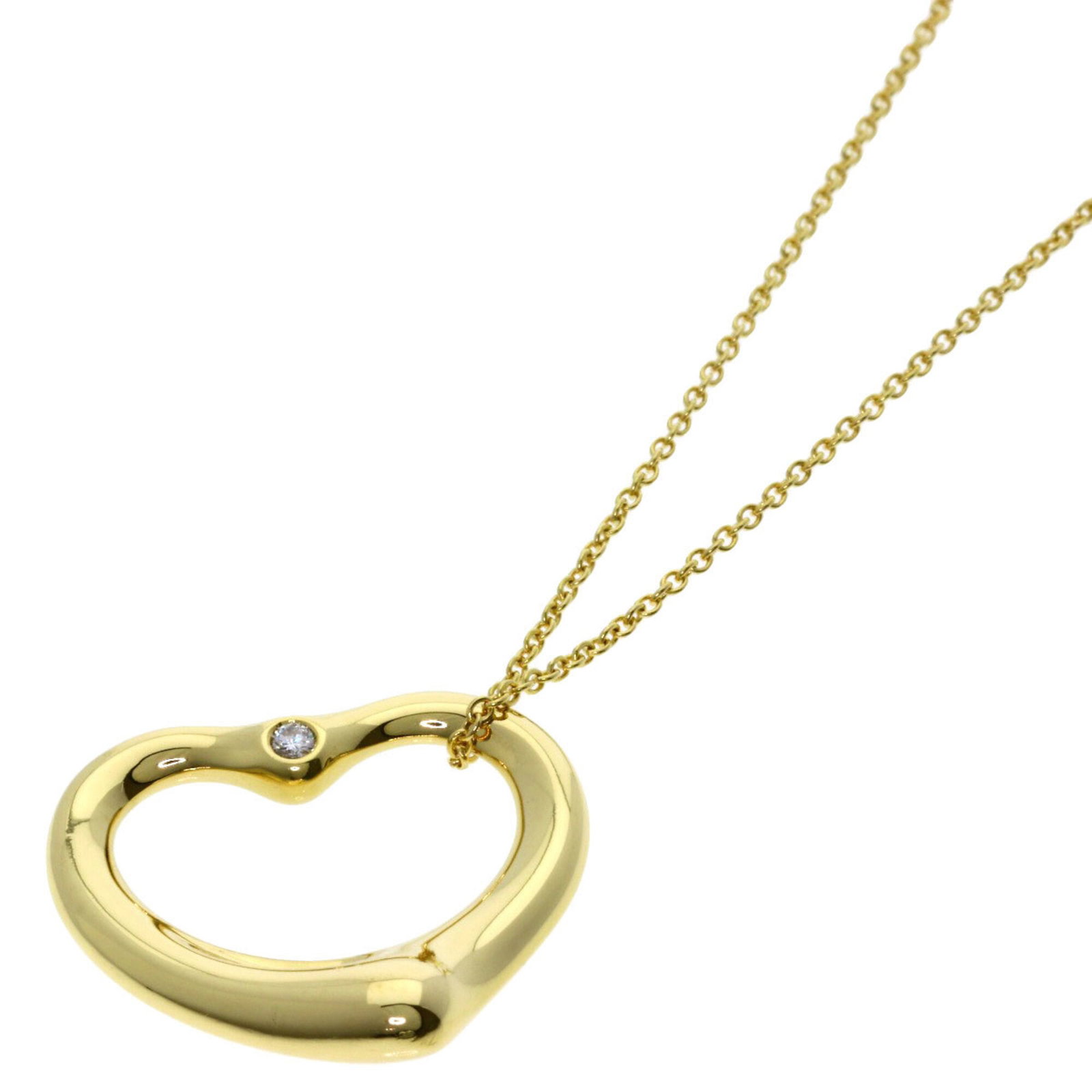 Tiffany & Co. Open Heart 1P Diamond Necklace 18K Yellow Gold Women'S.: Tiffany & Co. Open Heart 1P Diamond Necklace 18K Yellow Gold Women'S. Tiffany & Co. Open Heart 1P Diamond Necklace in 18K Yellow Gold features a delicate open heart design adorned with one precious pe