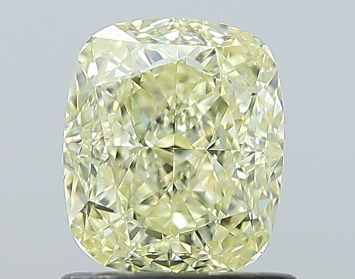 GIA Cushion Modified 1.21ct Fancy Yellow VVS1 - Loose Natural Diamond: GIA Cushion Modified 1.21ct Fancy Yellow VVS1 - Loose Natural Diamond 1.21ct Fancy Yellow VVS1 - Loose Natural Diamond, certified by the Gemological Institute of America (GIA), boasts a vibrant Fancy 