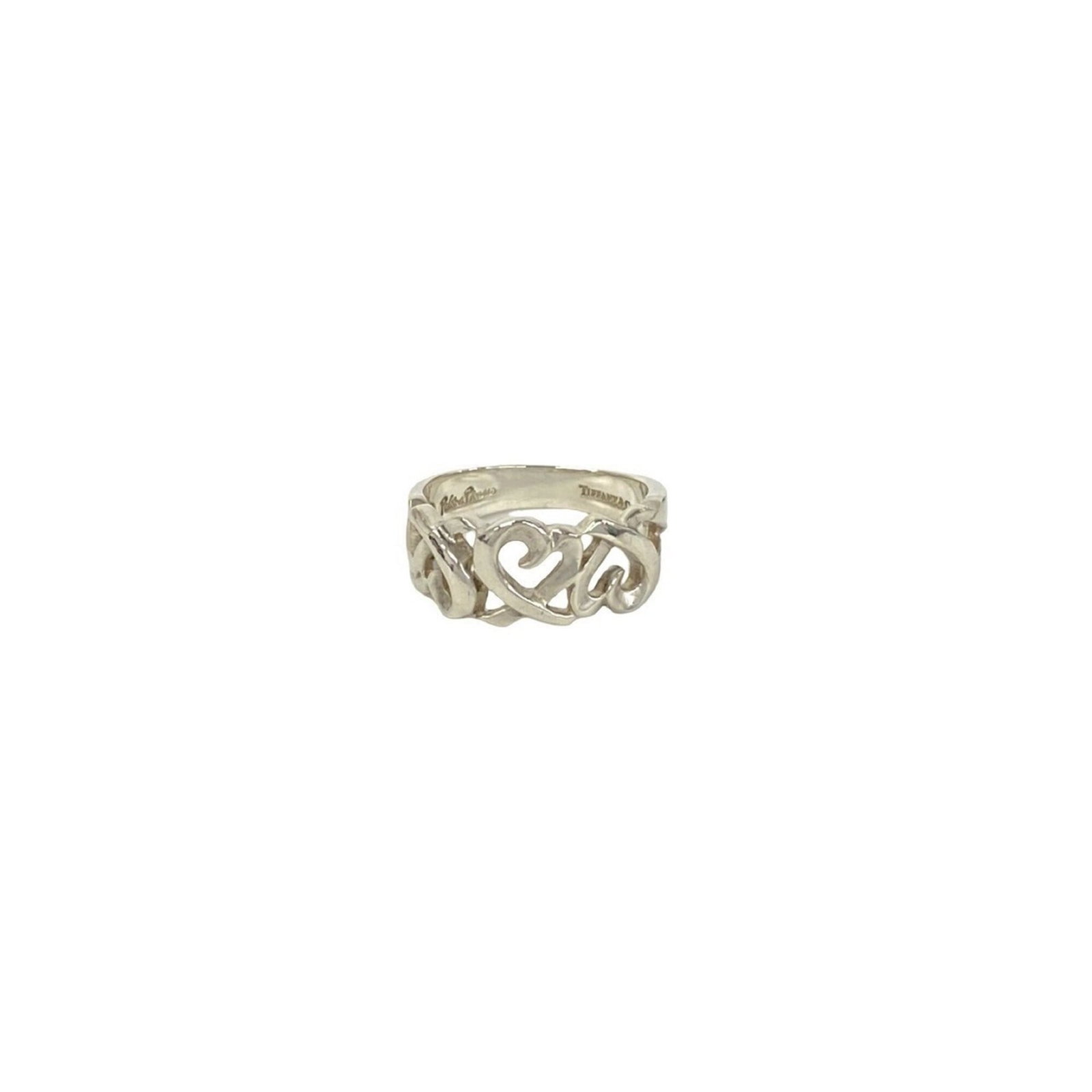 Silver Ring Band Tiffany: Silver Ring Band Tiffany Silver Ring Band Tiffany, US Size 6. A sterling silver band ring with a classic design from the iconic brand Tiffany. Made from high-quality silver material (925), this elegan