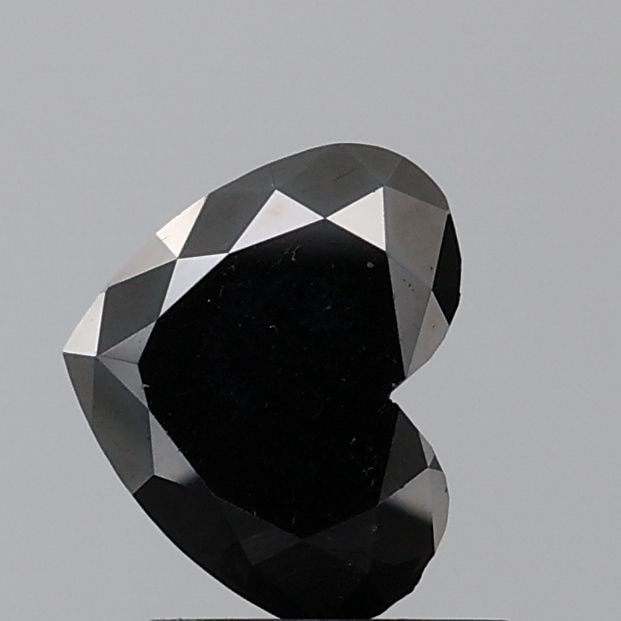 Heart 1.46ct Black VVS1 - Loose Natural Diamond: Heart 1.46ct Black VVS1 - Loose Natural Diamond 1.46ct Black VVS1 - Loose Natural Diamond with EX polish and symmetry, showcasing exceptional clarity in its natural state. This rare black diamond boas