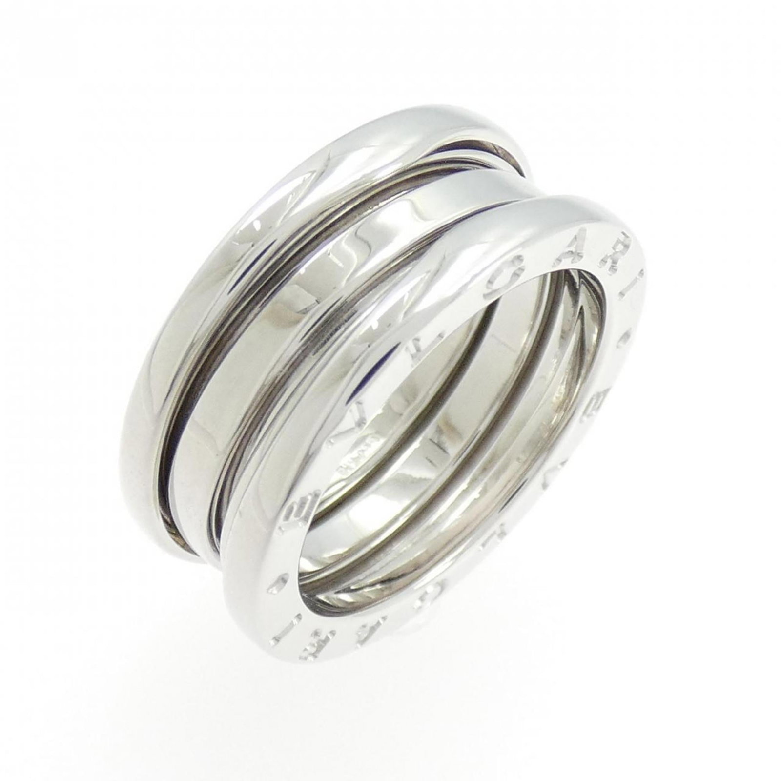 Bvlgari Band Ring White Gold: Bvlgari Band Ring White Gold White gold band ring from Bvlgari, available in US size 6. This elegant piece features a classic design made from high-quality white gold material. Item Specifics: Brand: 