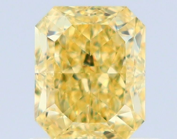 GIA Radiant 0.81ct Fancy Yellow VVS1 - Loose Natural Diamond: GIA Radiant 0.81ct Fancy Yellow VVS1 - Loose Natural Diamond GIA certification ensures the diamond's quality and authenticity. This Fancy Yellow VVS1 diamond boasts exceptional clarity, polish, and co