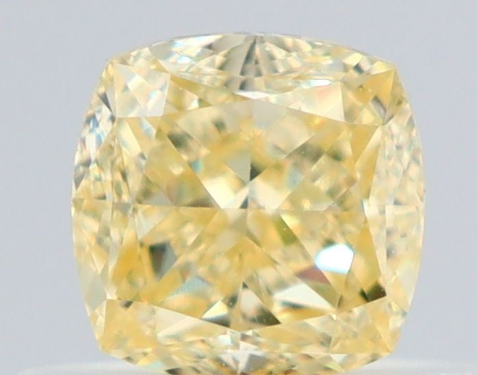 GIA Cushion Brilliant 0.56ct Fancy Yellow VVS2 - Loose Natural Diamond: GIA Cushion Brilliant 0.56ct Fancy Yellow VVS2 - Loose Natural Diamond GIA certified, this loose natural Fancy Yellow diamond boasts exceptional clarity and polish. Measuring 0.56 carats, its vibrant 