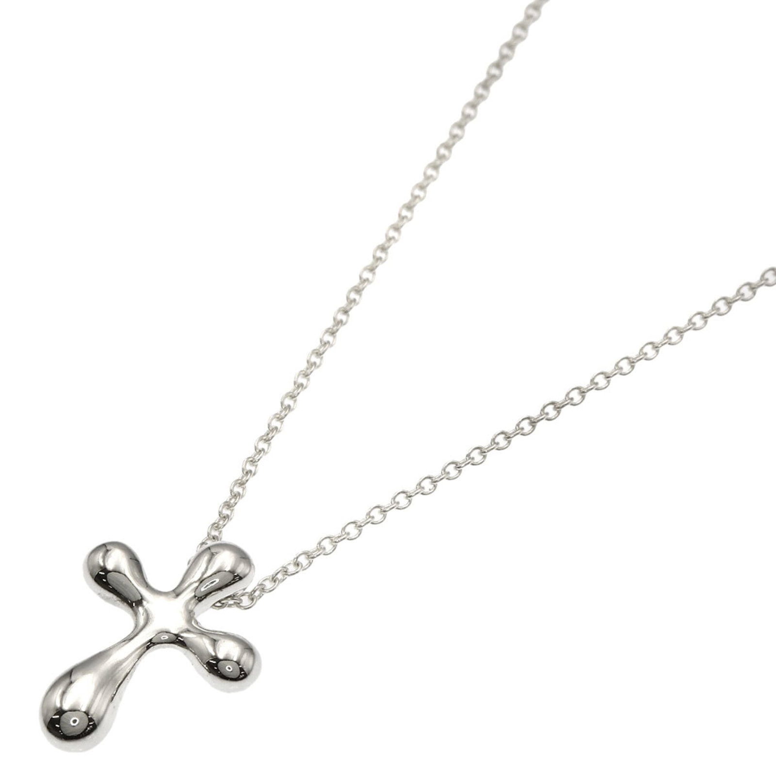 Tiffany & Co. Small Cross Necklace Silver Women'S.: Tiffany & Co. Small Cross Necklace Silver Women'S. Small Tiffany & Co. silver cross necklace with a pendant measuring 15.7mm x 11.7mm, set in a chain with a neck circumference of 42 cm / 16.53''. The 