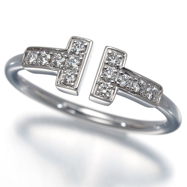 Tiffany&Co. Ring Diamond Tiffany T Wire Us5.25-5.5 18K 750 White Gold: Tiffany&Co. Ring Diamond Tiffany T Wire Us5.25-5.5 18K 750 White Gold Tiffany & Co.'s iconic design shines in this exquisite 18k white gold ring, featuring a natural diamond set within the signature
