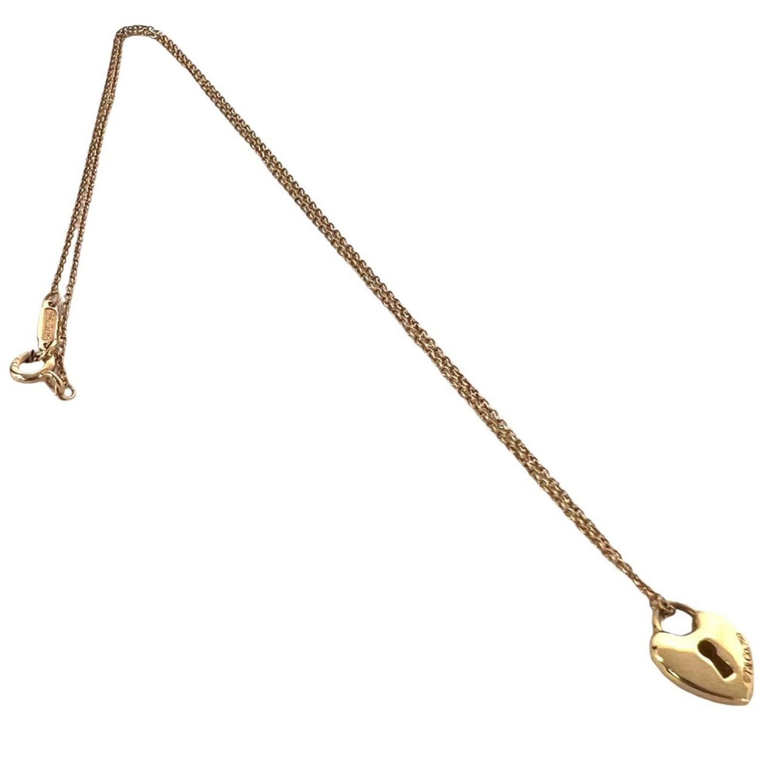 Tiffany&Co. Tiffany Heart Lock Necklace 18K Pink Gold 750 Pg Pendant Accessory 10988: Tiffany&Co. Tiffany Heart Lock Necklace 18K Pink Gold 750 Pg Pendant Accessory 10988 18K pink gold pendant necklace with a striking Tiffany Heart Lock design, set in a delicate 11mm x 9mm pendant