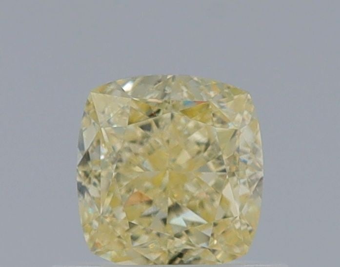GIA Cushion Brilliant 0.7ct Fancy Light Yellow VVS1 - Loose Natural Diamond: GIA Cushion Brilliant 0.7ct Fancy Light Yellow VVS1 - Loose Natural Diamond 0.7ct Fancy Light Yellow VVS1 Diamond - A Rare Natural Gemstone.GIA certified, this cushion brilliant diamond boasts a vibra