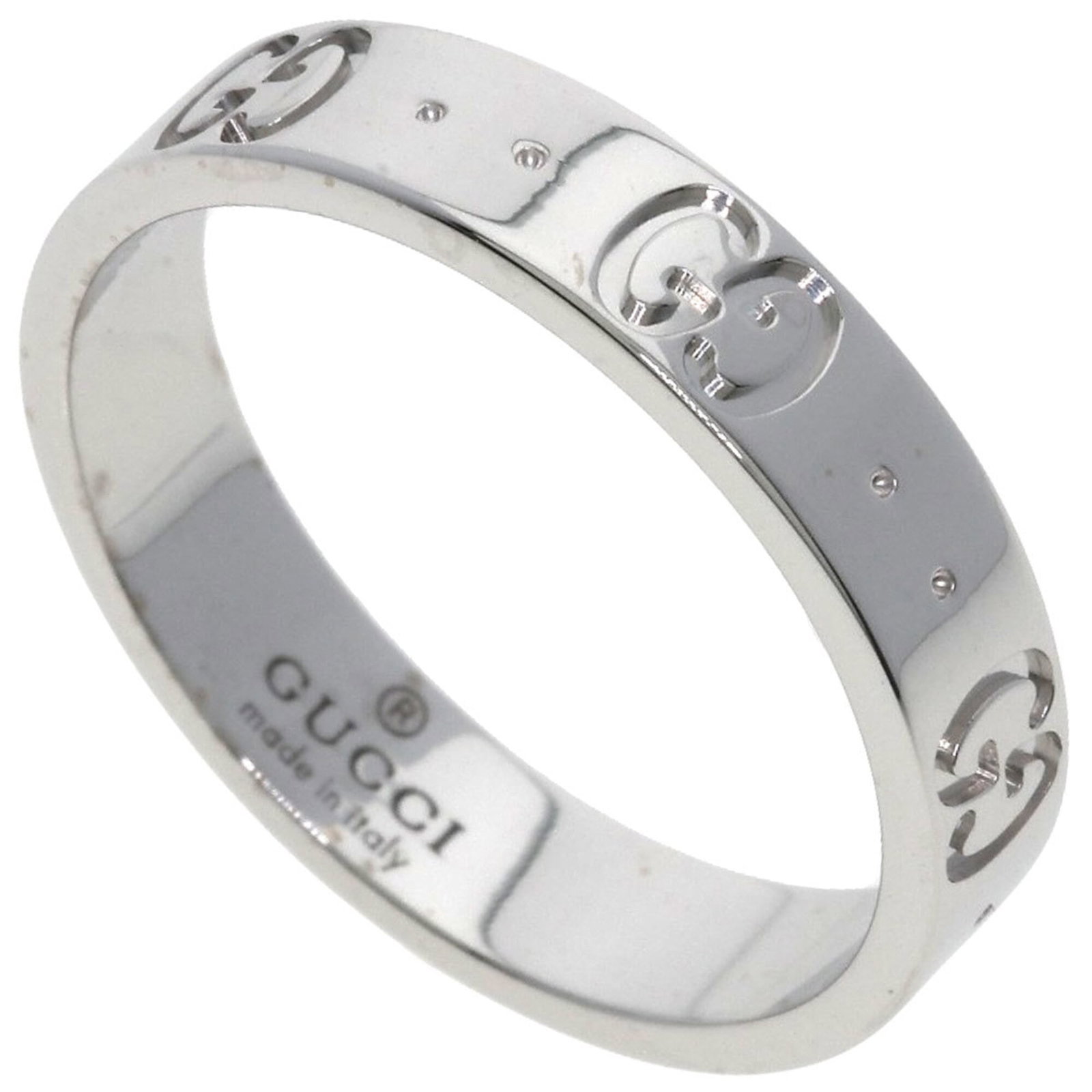 White Gold 18k Gucci Ring Band: White Gold 18k Gucci Ring Band White gold (18K) band ring from Gucci, available in US size 7. This elegant ring features the iconic luxury brand's signature style with a sleek and sophisticated design