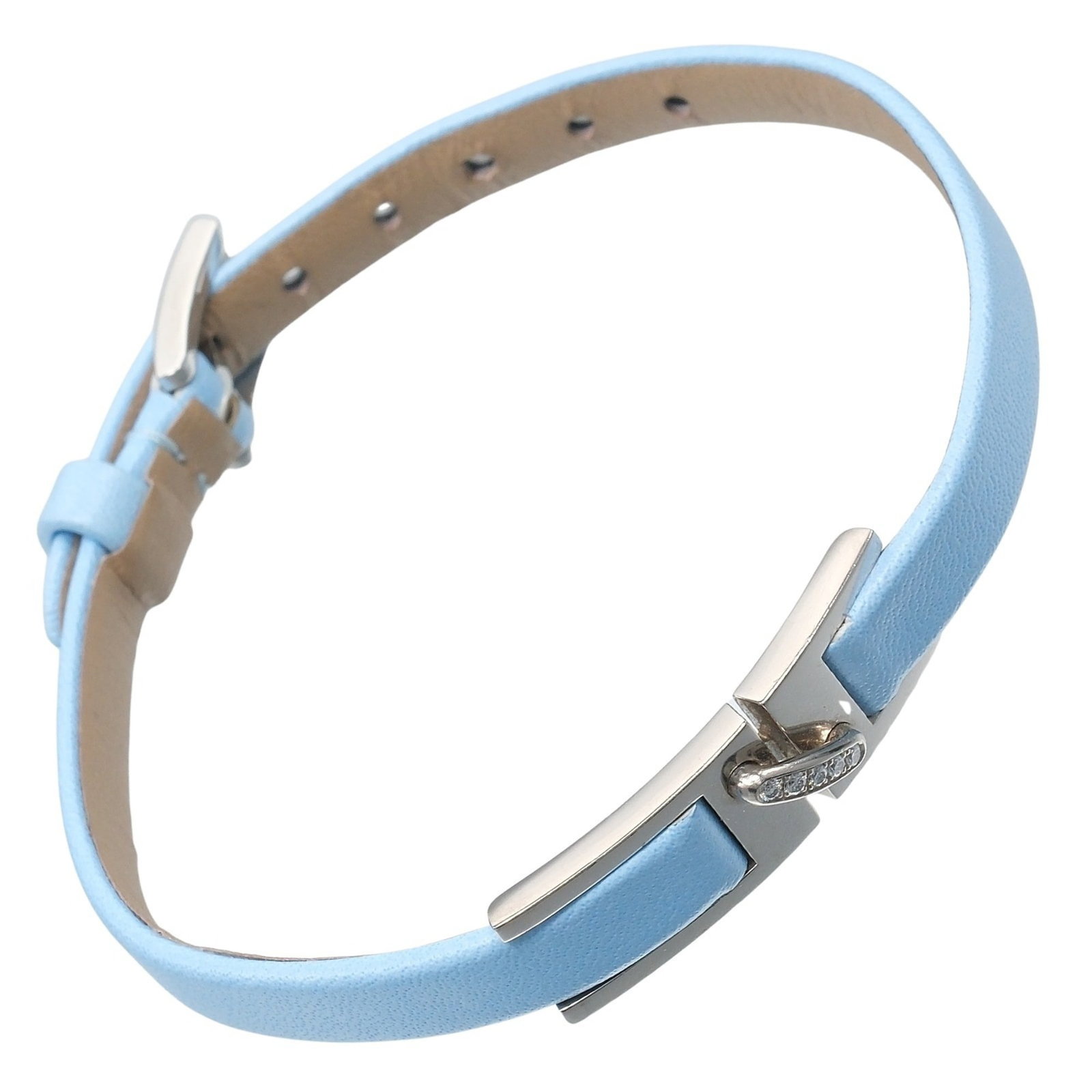 Chaumet Charm Bracelet Leather White Gold (18K): Chaumet Charm Bracelet Leather White Gold (18K) Chaumet's elegant charm bracelet boasts a supple leather strap and intricate white gold details, set with a sparkling diamond. The 14cm-17cm adjustable 