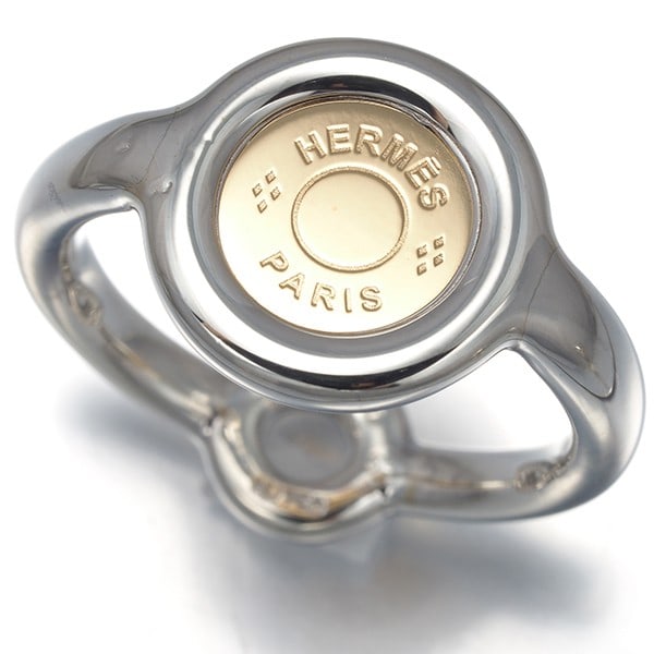 Hermes Ring Clou De Selle Eu53 925 Sterling Silver/ 18K 750 Yellow Gold: Hermes Ring Clou De Selle Eu53 925 Sterling Silver/ 18K 750 Yellow Gold Sterling silver and 18K yellow gold come together in the Clou de Selle ring, a timeless design from HERMES. This elegant ring
