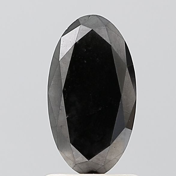 Oval 1.29ct Black VVS2 - Loose Natural Diamond: Oval 1.29ct Black VVS2 - Loose Natural Diamond Oval cut diamond with exceptional clarity and polish, boasting a striking black color. Measuring 9.57L x 5.23W x 3.79H, this loose natural diamond