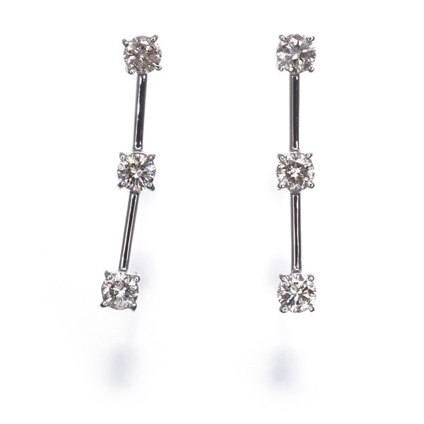 Diamond 0.33Ct/ 0.33Ct Drop Earrings 900 Platinum: Diamond 0.33Ct/ 0.33Ct Drop Earrings 900 Platinum The 0.33ct platinum drop earrings feature two natural diamonds, totaling 0.66ct, suspended from 900 platinum drops. Crafted with a focus on simplicity