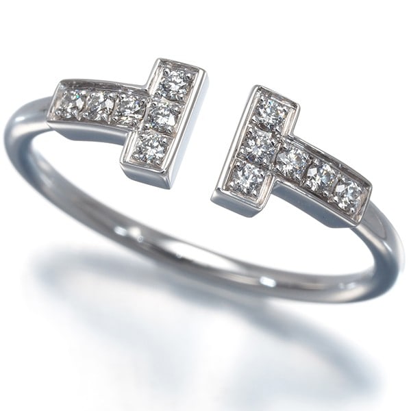 Tiffany&Co. Ring Diamond Tiffany T Wire Us6.75-7 18K 750 White Gold: Tiffany&Co. Ring Diamond Tiffany T Wire Us6.75-7 18K 750 White Gold Tiffany & Co.'s iconic ring features a stunning natural diamond set in 18k white gold, with a sleek Tiffany T wire design. The ring'