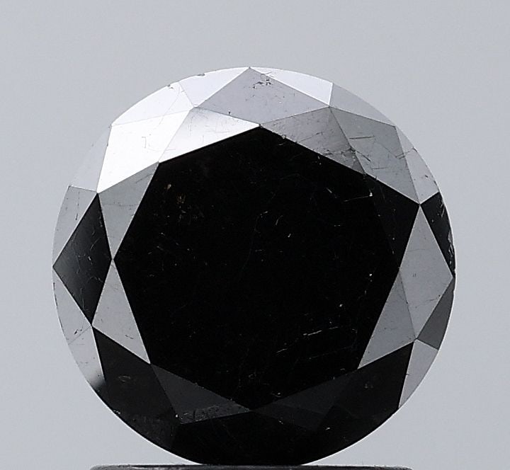 Round 1.79ct Black VVS2 - Loose Natural Diamond: Round 1.79ct Black VVS2 - Loose Natural Diamond Round 1.79ct Black VVS2 - Loose Natural Diamond, certified with EX cut, color, and symmetry, boasts exceptional clarity in its VVS2 grade. This rare gem